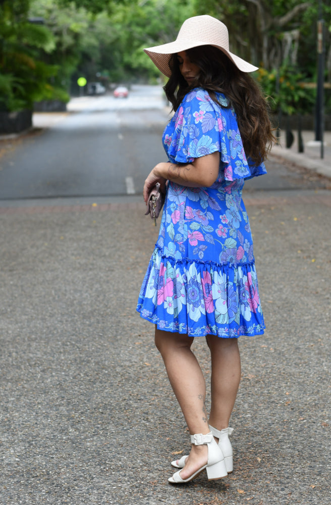 Sky Garden Mini Dress, Side View Large Ruffle Hem Flutter Sleeves